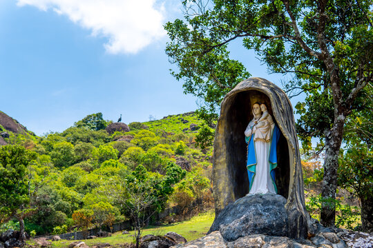 In the serene beauty of Vagamon, Mother Mary cradles the statue of Baby Jesus in her arms, radiating love, compassion, and divine grace, inviting reverence and reflection
