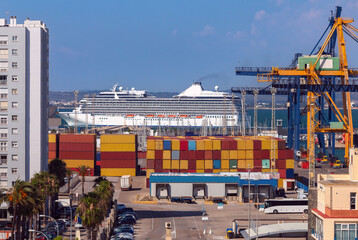 Container terminal at the port in Cadiz on a sunny day. - obrazy, fototapety, plakaty