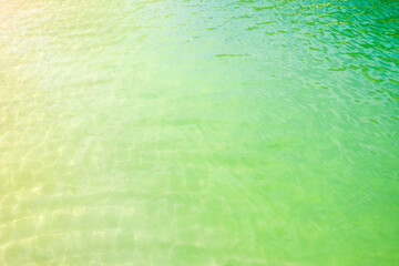 Lake with colorful green clean water in the summer in Carpathians mountains. Sutovo, Slovakia.