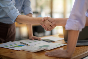 Business handshake after discussing good deal of Trading and become a business partner