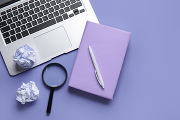 Composition with book, pen, magnifier, crumpled paper balls and laptop on color background. World Poetry Day celebration