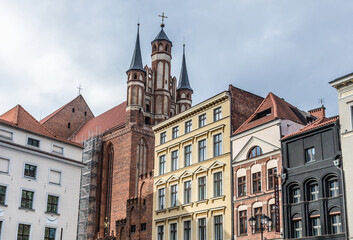 Assumption Church and buildings on main square of historic part of Torun, Poland