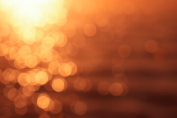 orange Sunset bokeh on the sea background 