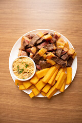 Picanha with fried polenta and flour