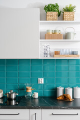 kitchenware and cooking pot on electrical stove at home kitchen