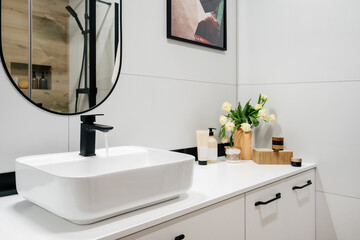 natural organic cosmetics products near washbasin on countertop