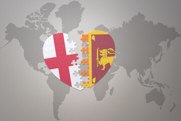puzzle heart with the national flag of sri lanka and england on a world map background.Concept. - obrazy, fototapety, plakaty