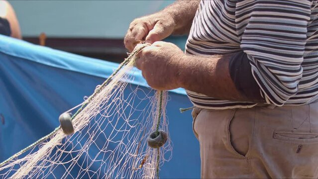 Old Fisherman Hand Holding A Fishing Net Footage.