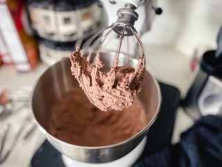Chocolate Hazelnut Mousse on a Stand Mixer Whisk Attachment: Close-up view of chocolate hazelnut mousse mixed in a stand mixer