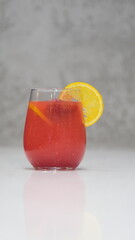 strawberry drink with a lemon slice