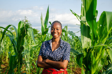 Fototapeta na wymiar portrait of an excited and happy female african farmer