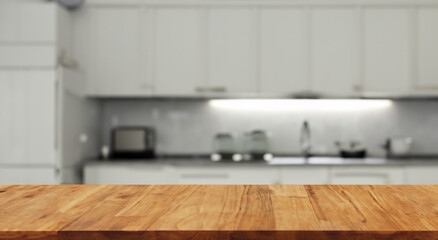 beautiful defocused kitchen with a new bar wood table with good day lighting in the morning