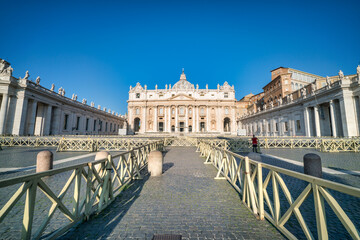 Fototapeta na wymiar View of Saint Peter's Basilica and square in morning light. Vatican, Italy