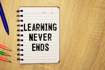 Learning Never Ends, text words typography written on paper, educational life.
