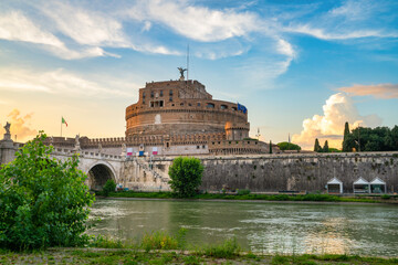 Saint Angel Castle and bridge seen from Tiber river canal in Rome. Italy