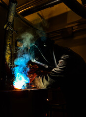 Stick welder hard at work in college 