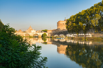Fototapeta premium Saint Angel Castle and bridge seen from Tiber river canal in Rome. Italy
