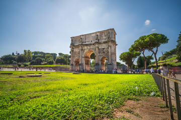 Fototapeta na wymiar The Arch of Constantine on sunny day in Rome, Italy
