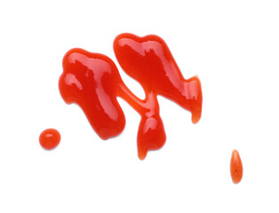 Tasty ketchup smear isolated on white, top view. Tomato sauce