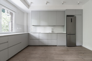 Modern kitchen with gray wood cabinets