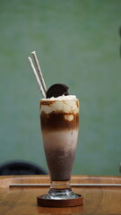 Coffee with liquid served on the table
