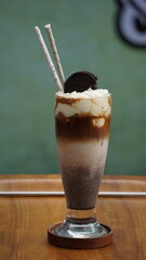 Coffee with liquid served on the table