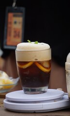 Coffee with liquid served on the table