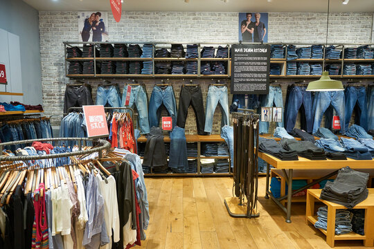 ABU DHABI, UAE - CIRCA JANUARY, 2020: various jeans displayed in Mavi store.