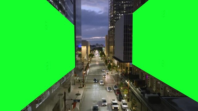 Flying in middle of Chroma key banners inside a city skyline - VFX motion graphics