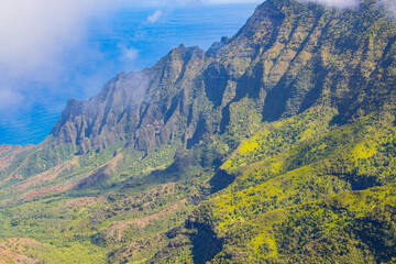 Fototapeta premium Clouds Shrouding The Na Pali Cliffs of Waimea Canyon, Waimea Canyon, Waimea State Park, Kauai ,Hawaii, USA