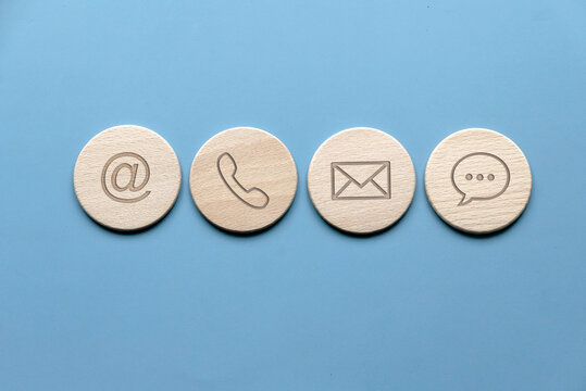 Icon Of Communication Type On Wooden Circle. Contact Us Or Customer Support Hotline People Connect.