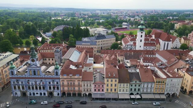 Colorful facade of the old town at the historic market square. Smooth aerial top view flight 
Budweis Budejovice old town in Czech Republic, summer of 2023. boom sliding to left drone
4K uhd footage.