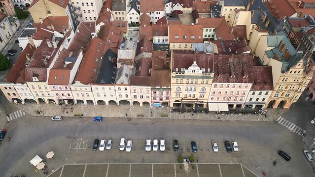 Colorful facade of the old town at the historic market square. Great aerial top view flight 
Budweis Budejovice old town in Czech Republic, summer of 2023. descending drone
4K uhd footage.