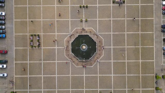Fountain in the center of the historic market square. Best aerial top view flight 
Budweis Budejovice old town in Czech Republic, summer of 2023. vertical bird's eye view drone
4K uhd footage.