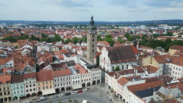 old Tower at the historic market square. Gorgeous aerial top view flight in
Budweis Budejovice old town in Czech Republic, summer of 2023. panorama orbit drone
4K uhd footage.