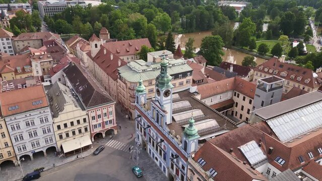 City Hall at the historic market town square. Magic aerial top view flight 
Budweis Budejovice old town in Czech Republic, summer of 2023. fly reverse drone
4K uhd footage.