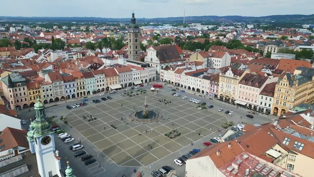 Fountain in center of historic market square Colorful facade. Fabulous aerial top view flight 
Budweis Budejovice old town in Czech Republic, summer of 2023. overflight flyover drone
4K uhd footage.