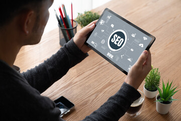 SEO search engine optimization for modish e-commerce and online retail business showing on computer...