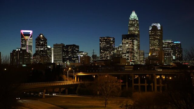 Lockdown Shot Of Illuminated Towers And Roads In City Against Sky At Night - Charlotte, North Carolina