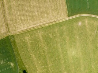 Aerial view of rural road through farmland in Switzerland