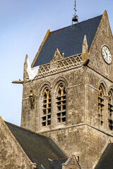 the historical church of Sainte Mere Eglise in Normandy, France