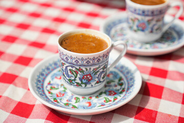 a cup of turkish coffee on table outdoor 