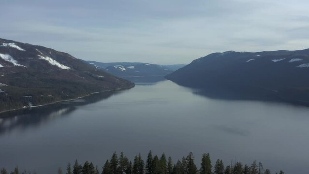 Gloomy Tranquility: Exploring the Mysterious Charms of Mabel Lake in the Spring