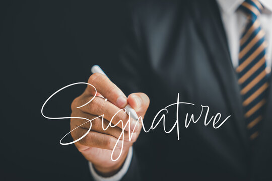 Digital entrepreneur signs electronic documents online on a black background. Depicts the online signing process, digital document management, and the paperless concept. Agreement is established.