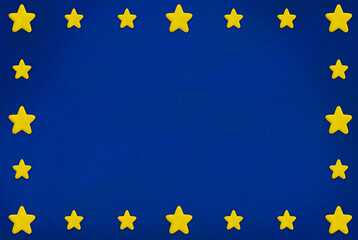 plasticine yellow star border on blue background