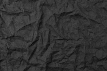 Crumpled linen fabric background.