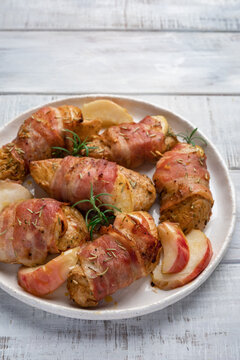 Bacon wrapped turkey or chicken breast with apple slice