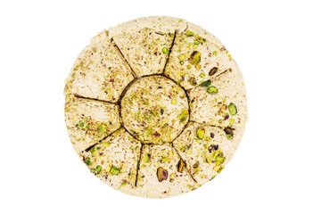 Sesame halva with pistachios isolated on a white background.Top view