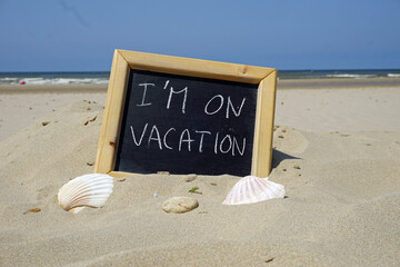 I am on vacation written