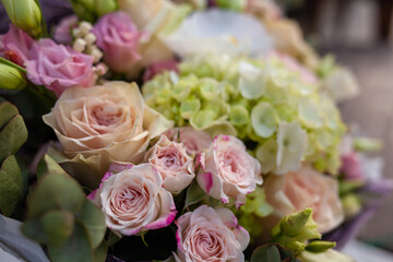 Wedding bouquet close-up. Flower gift for a person. Composition of flowers in a bouquet.